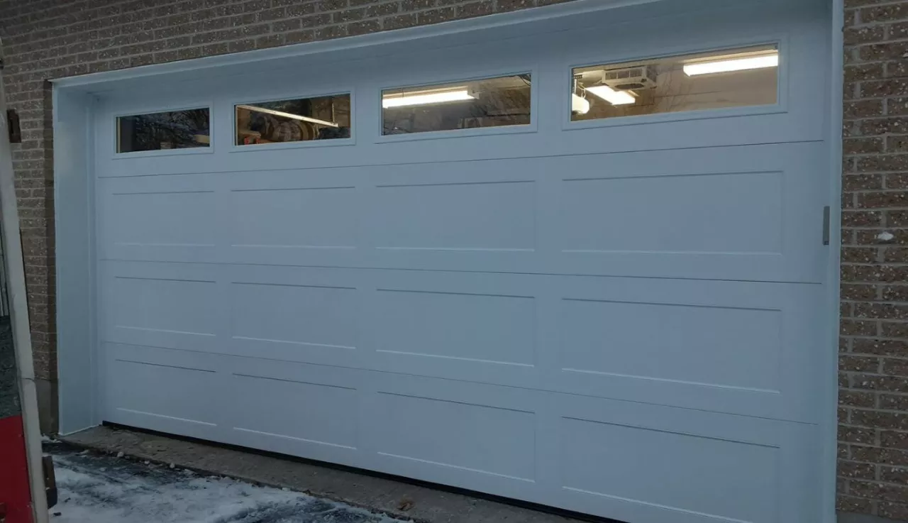 Porte de garage installée par Portes Gignac