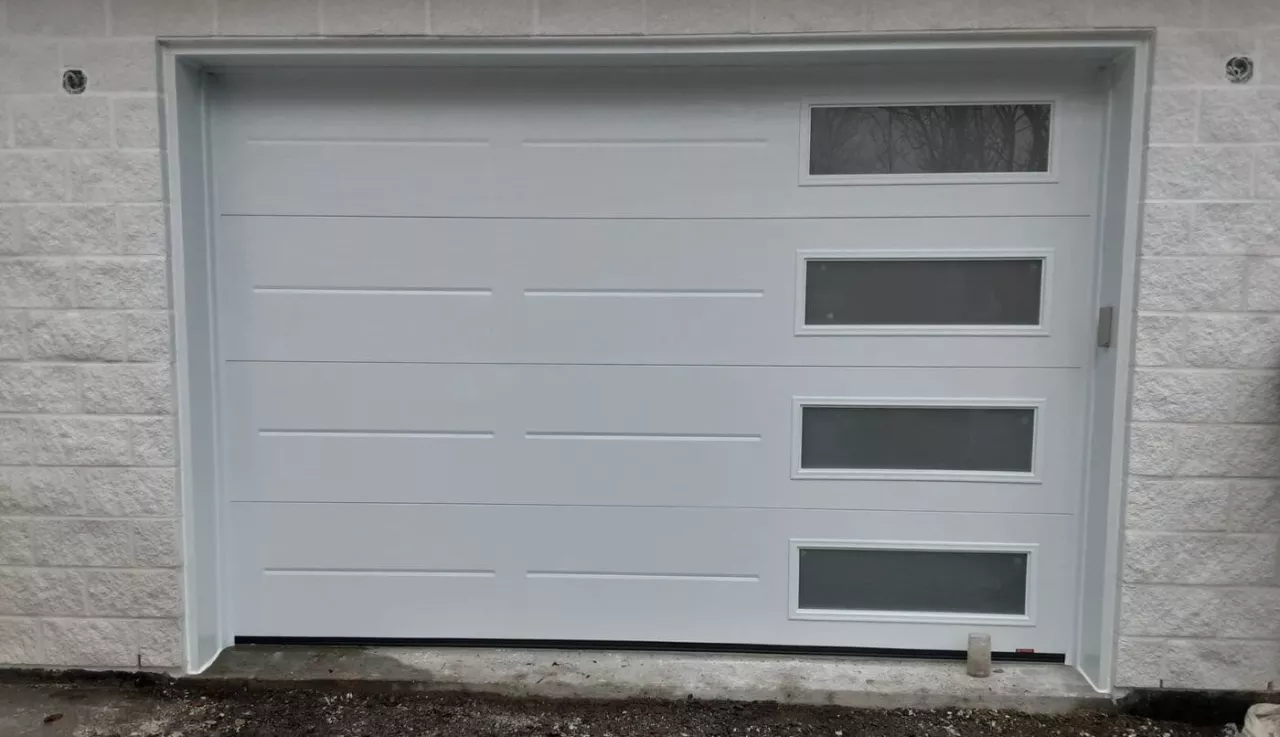 Porte de garage installée par Portes Gignac